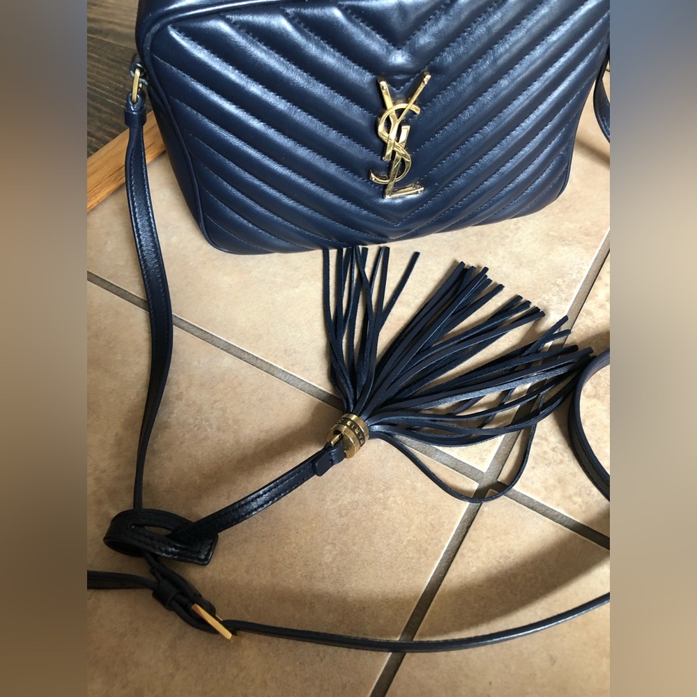 Navy YSL Lou camera bag purse.